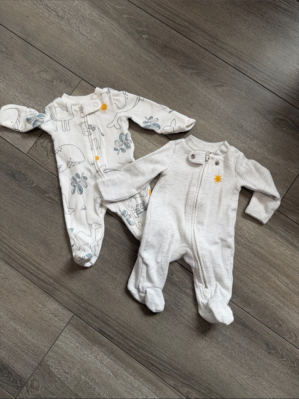 Cozy White Footed Baby One-Piece with Yellow Sun Detail